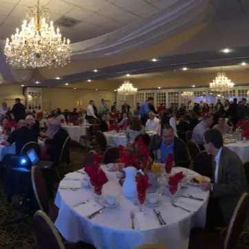 Panoramic shot from West Pasco Prayer breakfast 2018, guests at tables